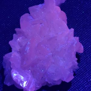 305g Natural Calcite Fluorescent Mineral Specimen under UV light